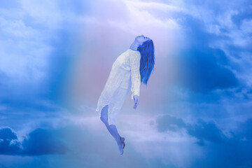 Ascension of the soul. The ghost of a woman ascends to heaven. Immortality, meditation, afterlife...