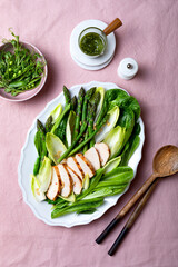 Green asparagus, grilled chicken, pesto, chicory, romen, green peas and pine nuts salad