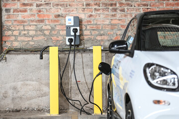 auto voiture electrique garage borne chargement charge batterie autonomie