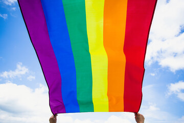 Colorful LGBT flag blows in the breez.