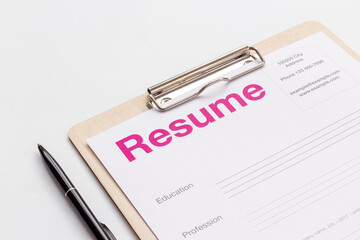 Resume application form on office table. Find new job concept