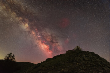 Milky Way core above hilltop lookout tower