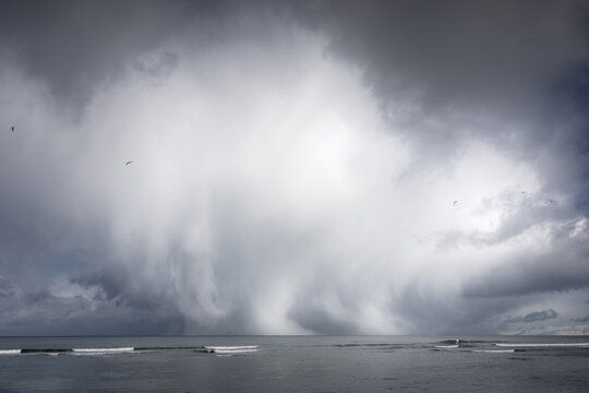 Rainclouds over the sea. © Nathalie