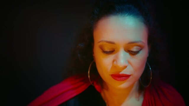 Evil witch conducting occult rite, telling spell over pentagram, calling spirits