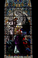 Obraz premium Basilica of the National Vow (Spanish: Basílica del Voto Nacional), Quito, Ecuador. Stained glass depicting Jesus with an angel in the garden of olives