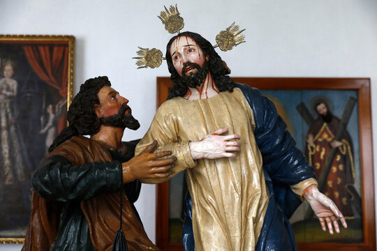 Fray Pedro Gocial museum in San Francisco's convent, Quito, Ecuador. Detail of a 17th-century sculpture depicting the treason of Jesus by Judas