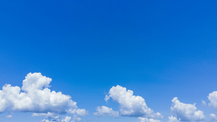 Naklejka na ściany i meble Blue sky background and white clouds soft focus at Phuket Thailand.