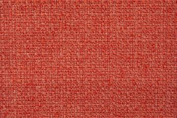 Background image - embossed texture of red rough fabric
