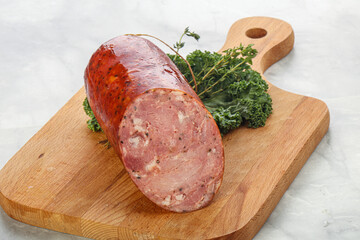 Pork ham sausage over board