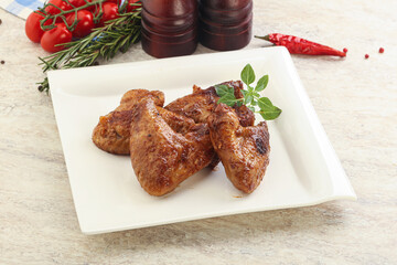 Roasted chicken wings with spicy sauce