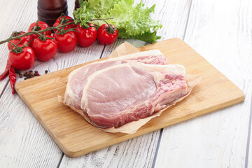 Raw pork t-bone steak for grill