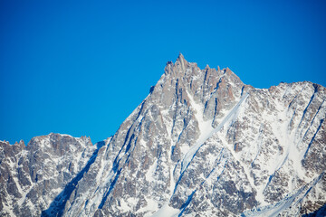Aiguille du Midi peak on Mont Blanc mountain in the French Alps - obrazy, fototapety, plakaty