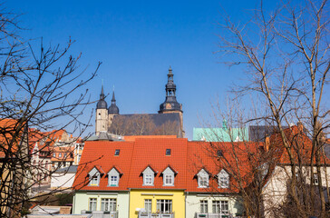 Colorful houses in front of the Andreas church in Eisleben, Germany