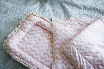 baby cocoon and handmade bedspread with cotton lace