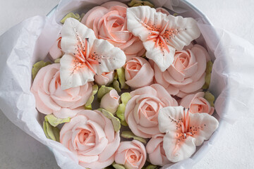 Zephyr bouquet of flowers in a beige box on a gray background