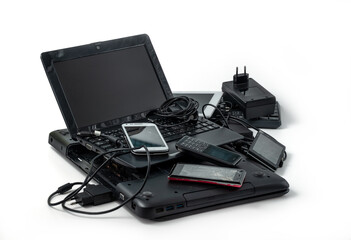Electronic waste ready to recycle, isolated on white background.  pile of mixed electronic waste,...