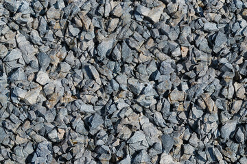 Crushed stone. Seamless texture, background.