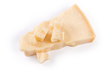 Different pieces of hard cheese on a white background