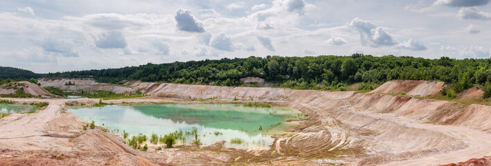 Panorama of small lake in the abandoned kaolin quarry - obrazy, fototapety, plakaty