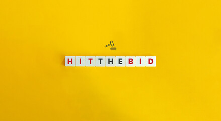Hit the Bid Term and Banner. Letter Tiles on Yellow Background. Minimal Aesthetics.