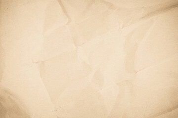 Brown recycled paper crumpled texture background. Cream Old vintage page or grunge vignette parchment old blank