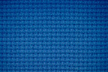 Closeup of blue fabric texture for background used. Pattern blue dark denim, linen, natural cotton...