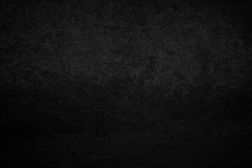 Art black concrete stone texture for background in black. Abstract color dry scratched surface wall grey dark detail covering.