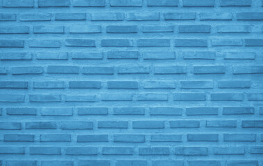 Brick wall painted with pale dark blue paint texture background. Brickwork and stonework flooring interior rock old pattern.