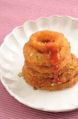 Deep fried onion rings, a tea time snack