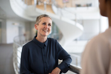 Senior businesswoman meeting with a coworker