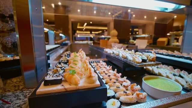 Japanese food self-service luxury hotel in Tunisia. All-you-can-eat buffet during lunch, dinner time. Resort restaurant. All inclusive. Buffet food. Self-service restaurant. Self service meals. Cateri
