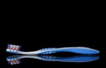 Tooth brush isolated on a black background