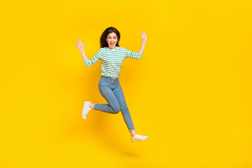 Fototapeta na wymiar Full size photo of good mood cheerful lady traveling during summer vacation have fun isolated on yellow color background