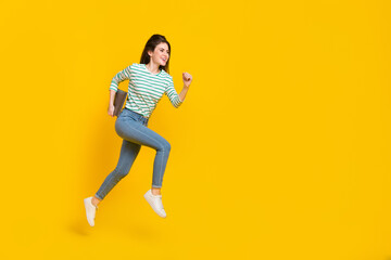 Fototapeta na wymiar Full size photo of good mood businesswoman traveling with laptop isolated on yellow color background