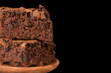 Gourmet brownies on black background