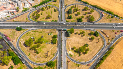Aerial view of the Great Ring Junction in Rome, Italy. It's a long orbital motorway that encircles...