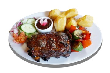 Barbecued spareribs with tomatoes and salad