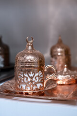 Obraz na płótnie Canvas Traditional turkish ornate metal tray in the gift shop