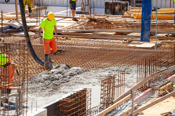 Concrete pouring on the construction site