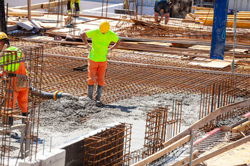Concrete pouring on the construction site