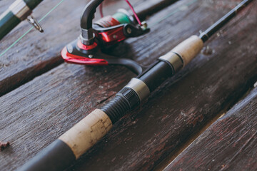 A rod and reel is on the table