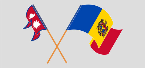 Crossed and waving flags of Nepal and Moldova
