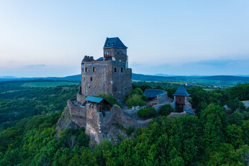Fototapeta na wymiar Aerial view about castle of Hollókő. Located in the mountains of Cserhát near Hollokő village, which declared a Unesco world heritage site.