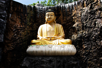 Beautiful amitabha buddha statue in garden for thai people travel visit respect praying in...