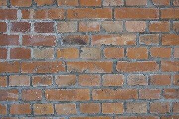 Red brick stone wall with grey cement fillings and cement spots, use: background, texture, wallpaper, copy space (horizontal), Hildesheim, Lower Saxony, Germany