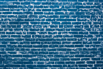 Blue brick wall of interior facade texture background architecture