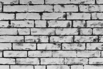 Grey brick wall of interior facade texture background architecture white