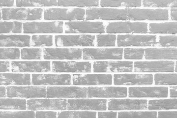 Grey brick wall of interior facade texture background architecture white