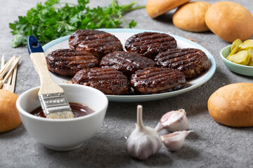 Delicious grilled cutlets and fresh buns for cooking burgers, food, outdoor eating