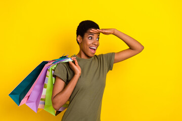 Photo of excited crazy person hand forehead look interested empty space isolated on yellow color...